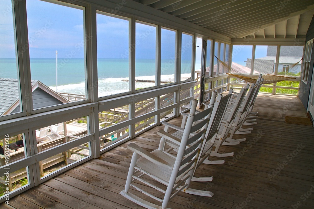 beach front with rocking chairs