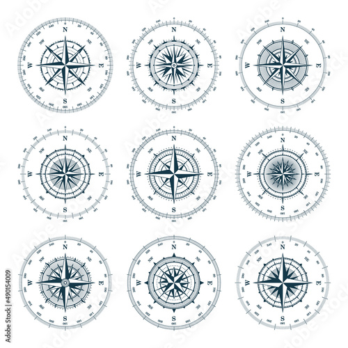 Vintage marine wind rose, nautical chart. Monochrome navigational compass with cardinal directions of North, East, South, West and degree markings. Geographical position, cartography and navigation.