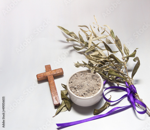 Obraz na plátně bowl with ashes and olive branch. ash wednesday concept