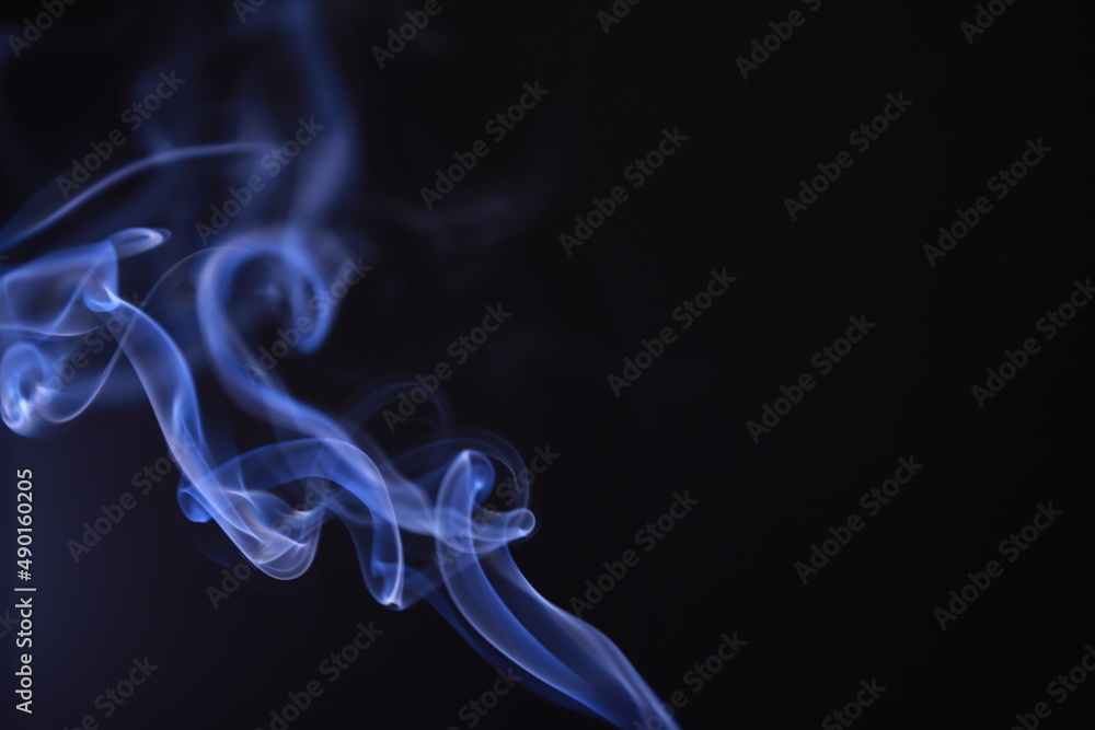 SMOKE IN LIGHT. SMOG ON BLACK BACKGROUND SMOKE IN LIGHT. SMOG ON BLACK BACKGROUND
