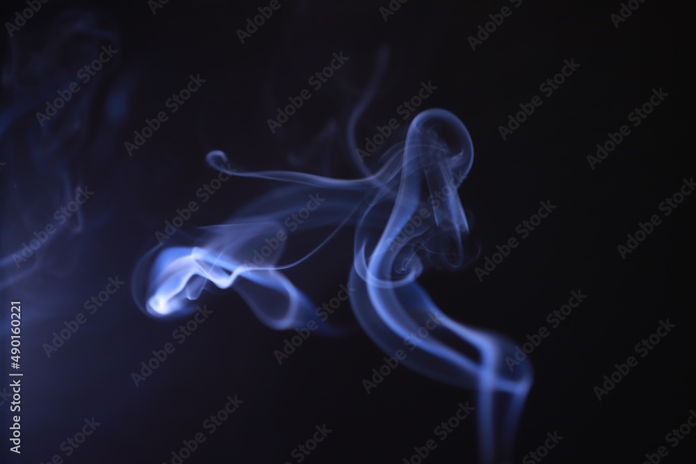SMOKE IN LIGHT. SMOG ON BLACK BACKGROUND SMOKE IN LIGHT. SMOG ON BLACK BACKGROUND