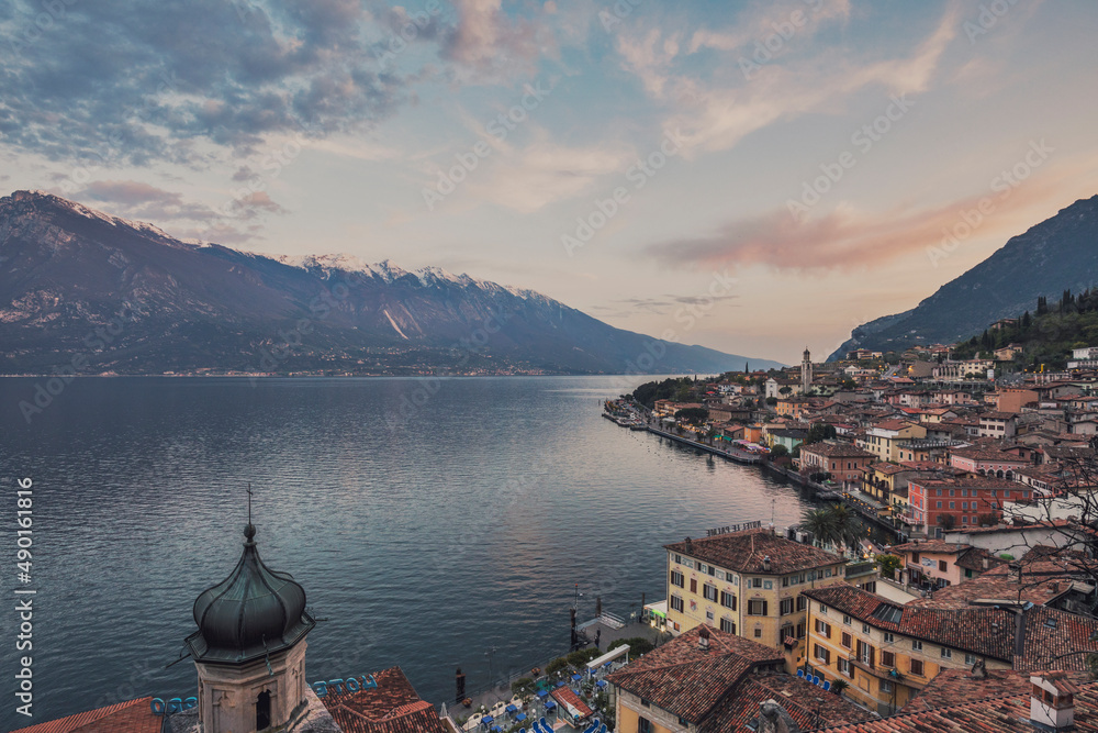 sunset over the lake garda and view on the mountains