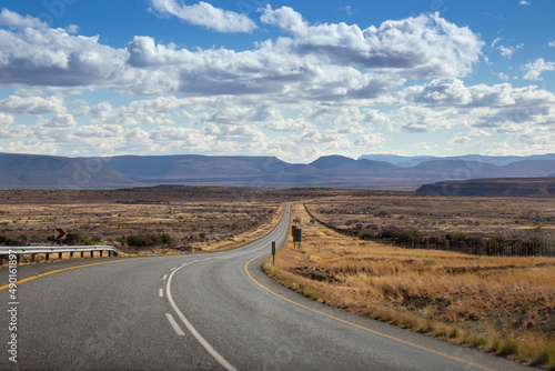 Photography Rural road through the desert landscape of the Free State in South Africa