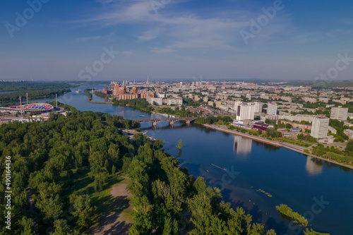 View of the city from a height, a wide river, a bridge, a view from a drone
