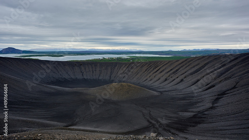 Scenic view of the inner crater of Hverfell volcano under a cloudy sky in Iceland photo