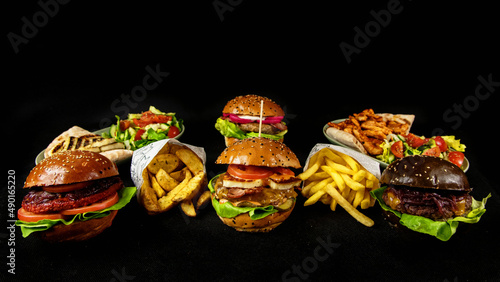 burger platter on black background