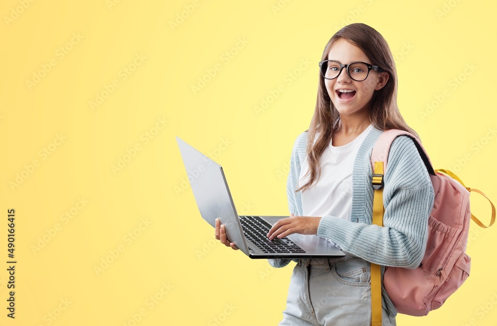 E-Learning. Happy School Girl Using Digital Tablet Doing Homework Online E-Learning. Happy School Girl Using Digital Tablet Doing Homework Online