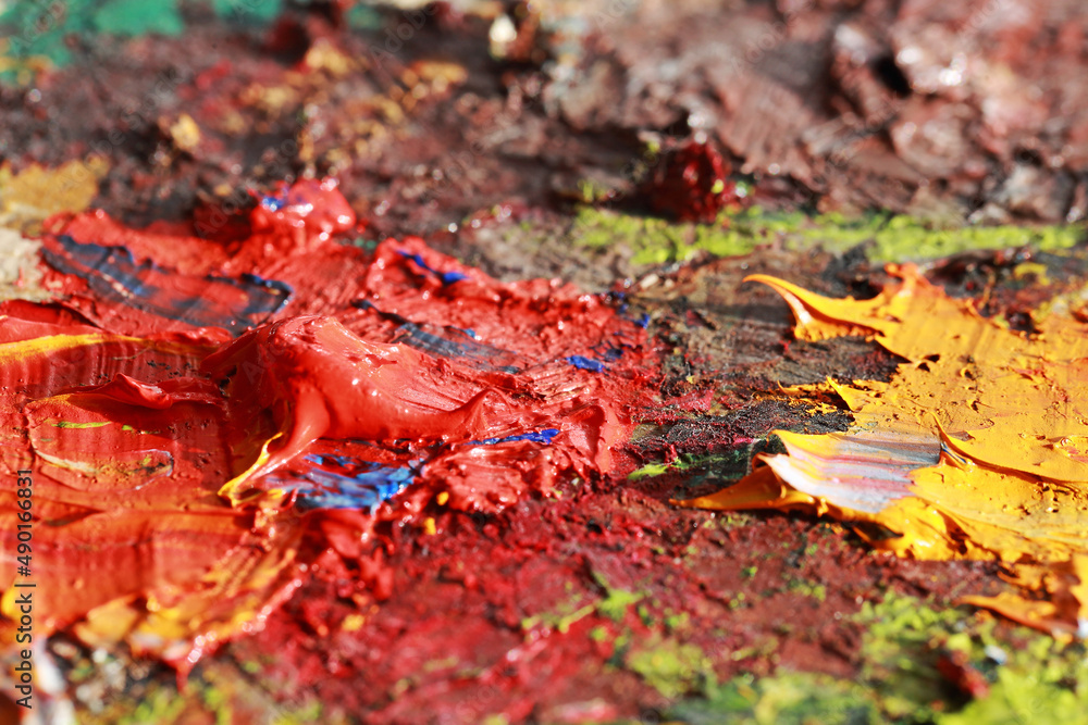 Multicolored brushstrokes of oil. Drops of oil on the canvas. Oil smears are taken up close. Colored texture. Paint stains. Abstract background. Modern Art Multicolored brushstrokes of oil. Drops of oil on the canvas. Oil smears are taken up close. Colored texture. Paint stains. Abstract background. Modern Art
