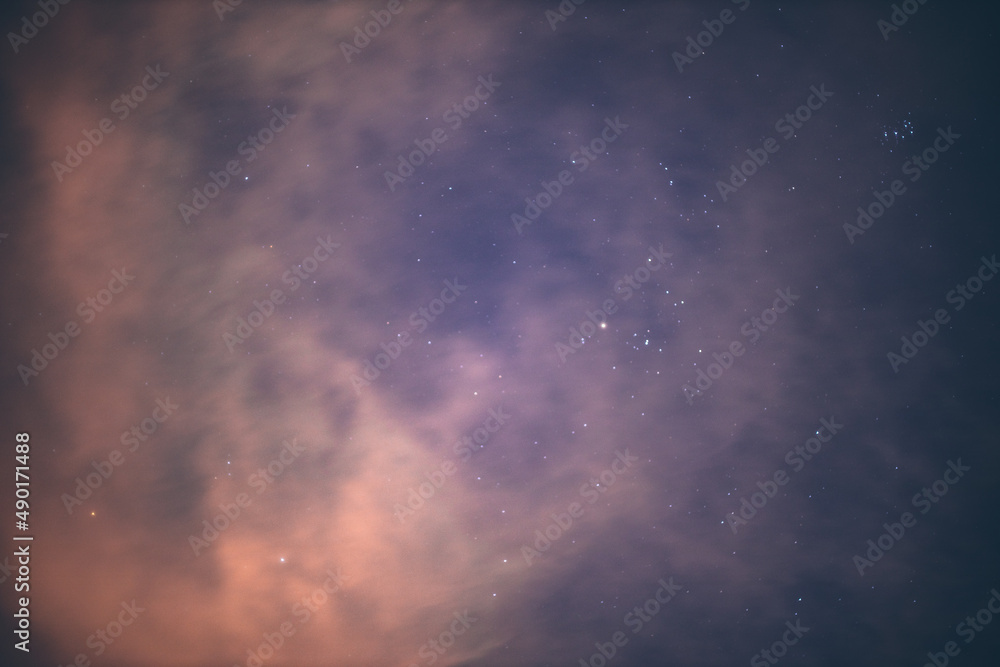 clouds in the sky with stars