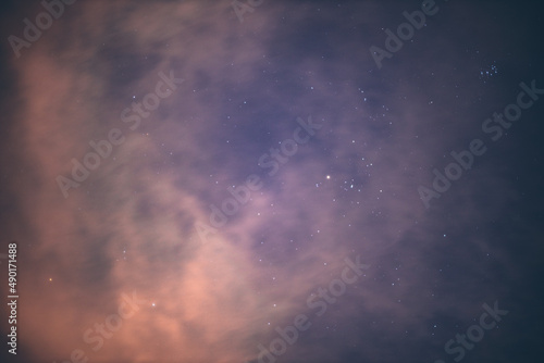 clouds in the sky with stars