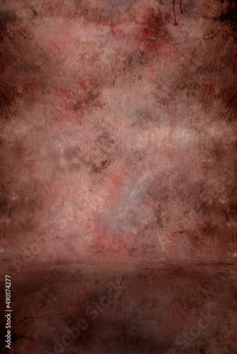 Shades of rust, red and hints of blue, various colors photography studio background, beautiful broad paint strokes for statement portraiture. © Second Banana Images