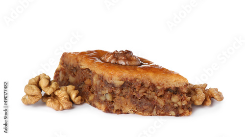 Delicious honey baklava with walnuts on white background