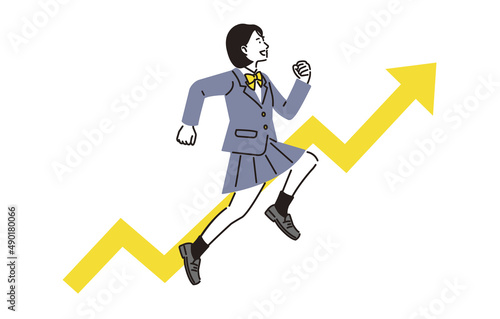 上を目指してジャンプする高校生の女の子