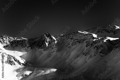 Grayscale shot of alpine mountains of Austria at dawn photo