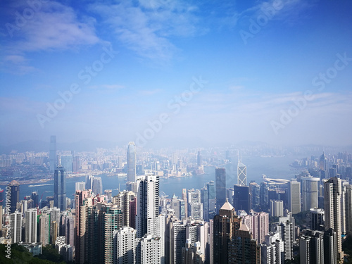 Фотография Aerial view of the modern city Hong Kong on a sunny day
