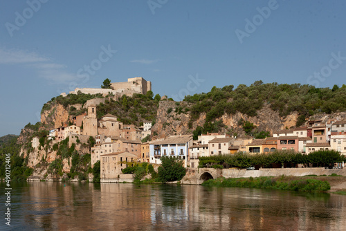 Closeup of a city on the hills near the lake photo