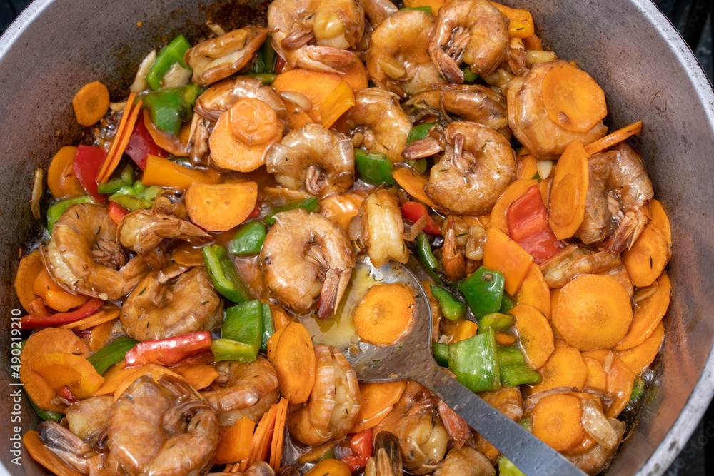 Fototapeta premium High angle shot of chop suey crevettes cooking on a pan