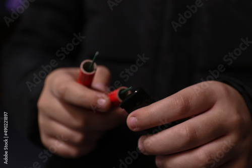 Canvas-taulu Kid Holding Dangerous Red Petards
