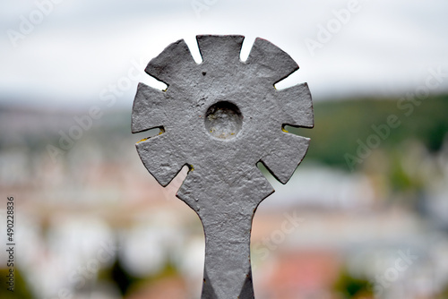 Closeup of a rusty self-made key with blurred background photo