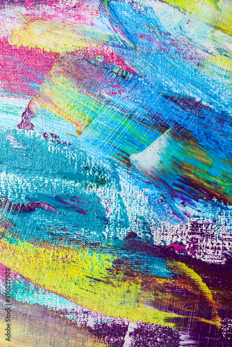 Strokes of colorful acrylic paints on canvas  closeup