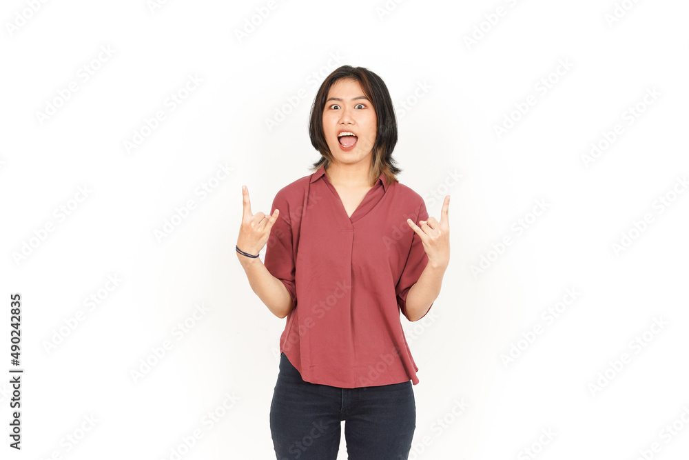 Showing Metal Hands Of Beautiful Asian Woman Isolated On White Background Showing Metal Hands Of Beautiful Asian Woman Isolated On White Background