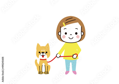 柴犬と散歩にでかける女の子