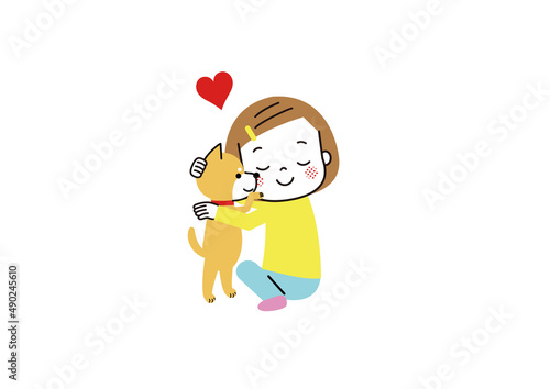 柴犬をぎゅっと抱きしめる女の子