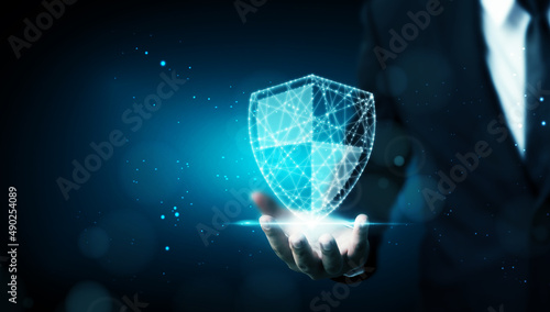 Protection network cyber security computer and safe your data concept, Businessman holding shield protect icon