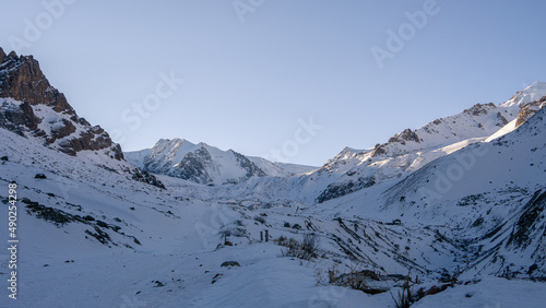Snow-white mountains and glaciers under the snow in winter