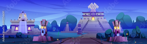 Ancient aztec village with temple, statues and stone buildings at night. Vector cartoon illustration of summer landscape with tropical forest and pyramid of mesoamerican mayan civilization photo