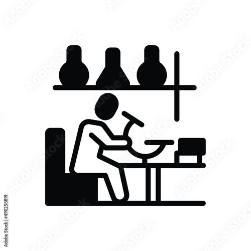 Black solid icon for scientist