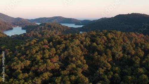 Scenery Of Dense Forest On The Mountain Islands At Mljet National Park During Sunset In Dalmatia, Croatia. Aerial Shot photo