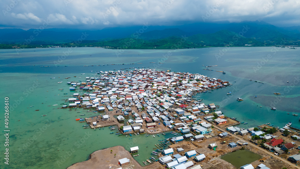 Fototapeta premium Aerial shot of Bungin island is the MOST POPULATED Island in the world after Earthquake 7.0 M Lombok