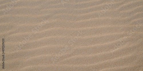 Fototapeta Naklejka Na Ścianę i Meble -  sand texture background panoramic with sandy wave pattern for web header panorama