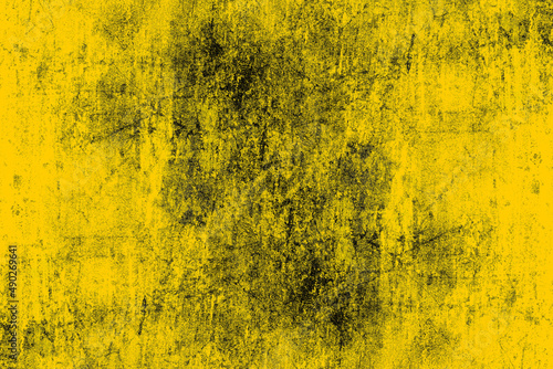 Rough grunge textured yellow color concrete wall surface for background