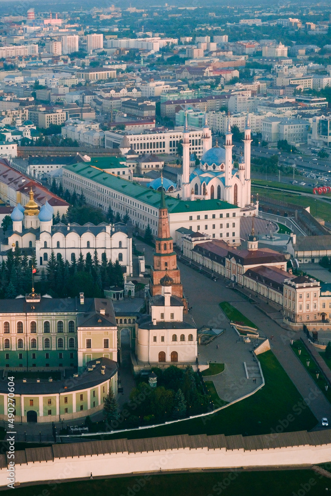 Panoramic summer shot from above of Kazan Kremlin. Tatarstan, Russia. Capital of the Republic of Tatarstan. City centre and landmark line with sunny weather. Sights, churches and mosque Kul-Sharif.