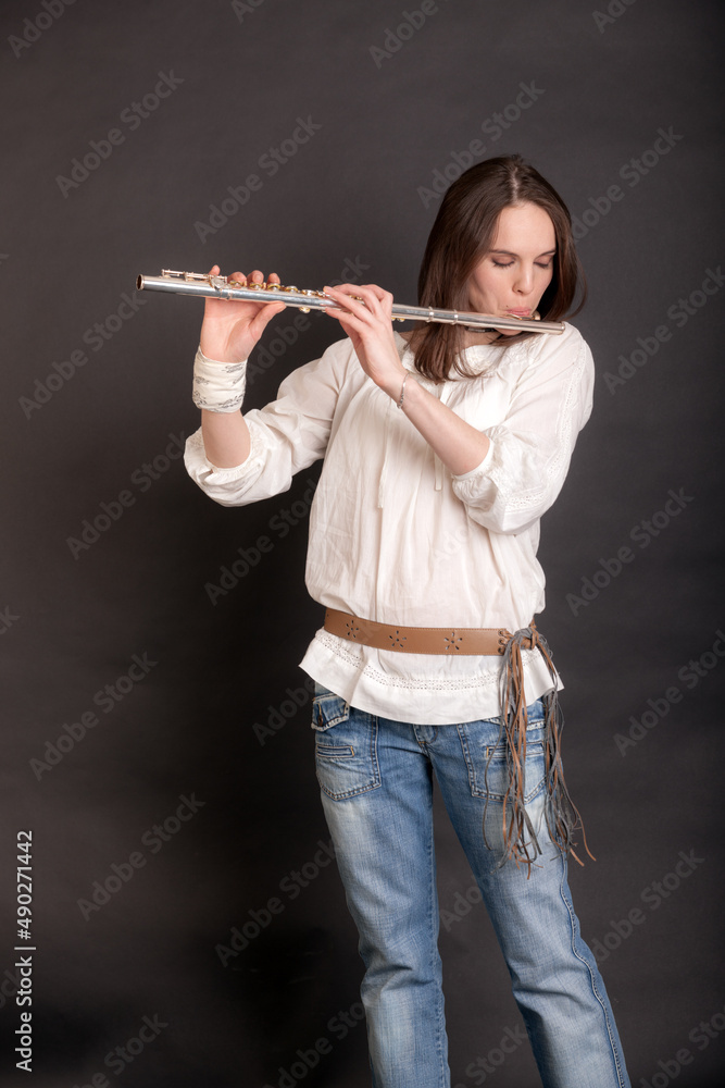 woman playing the flute woman playing the flute