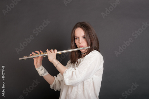 woman playing the flute