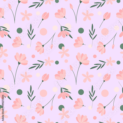 Delicate floral seamless pattern on pastel pink background. Pink flowers, green leaves, circles repeat print. Cute hand drawn ornament for textile, fabric, wallpaper, wrapping paper and decoration. © Ксения Хмель