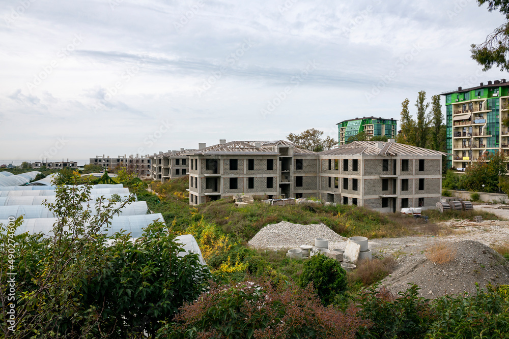 Boarding houses under construction in the resort town.