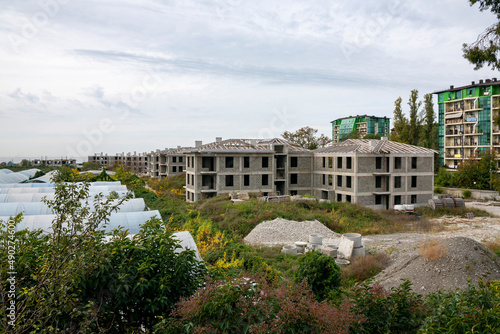 Boarding houses under construction in the resort town. © Vectorina