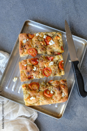 Delicious homemade Italian meal. Focaccia with Tomatoes, Garlic & Feta Cheese. Great for breakfast, tea break or light lunch meal.