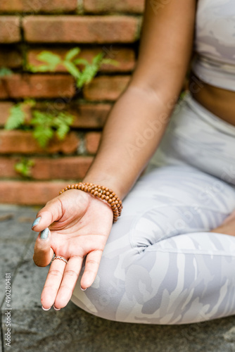 southeast asian woman doing Yoga Mediation closeup © Strathmore