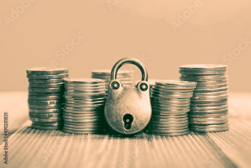 Sanctions concept, padlock and money
