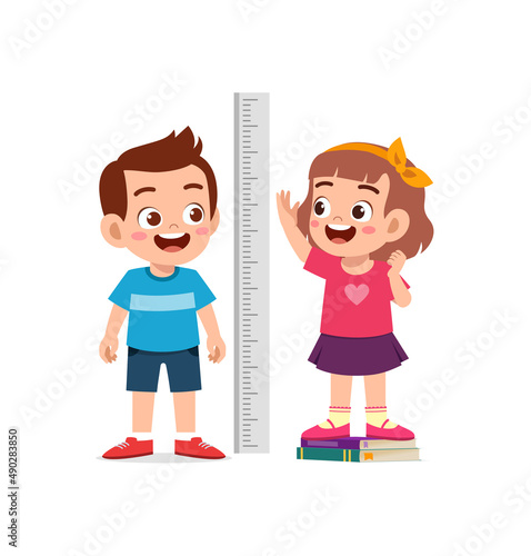 boy and girl measure height for grow progress