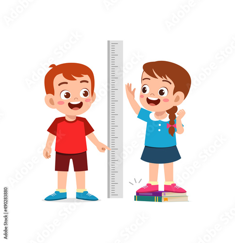 boy and girl measure height for grow progress