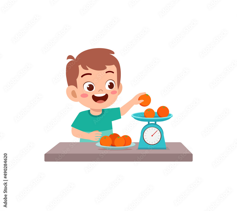little boy measure weight of fruit using weighing scale little boy measure weight of fruit using weighing scale