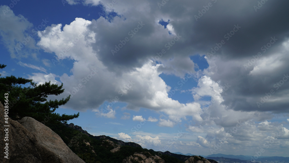 White clouds like cotton candy on a clear day. White clouds like cotton candy on a clear day.