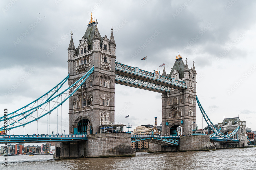 Fototapeta premium Tower Bridge in London - Cloudy day over the Thames river in the UK