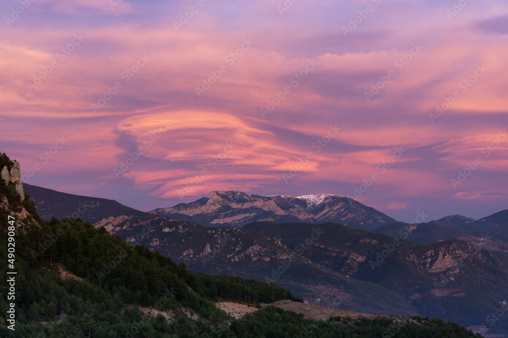 Sunset colors in the clouds over the Catalan Pyrenees mountains
